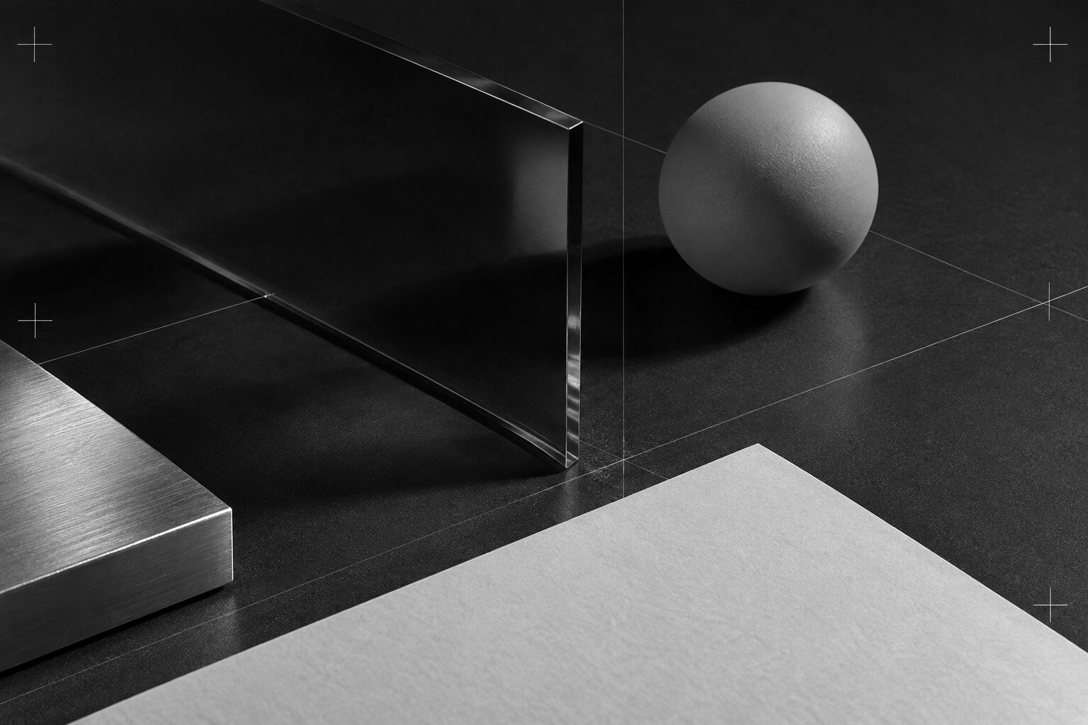 Studio still life: an acrylic sheet, a board and a sphere aligned on register lines